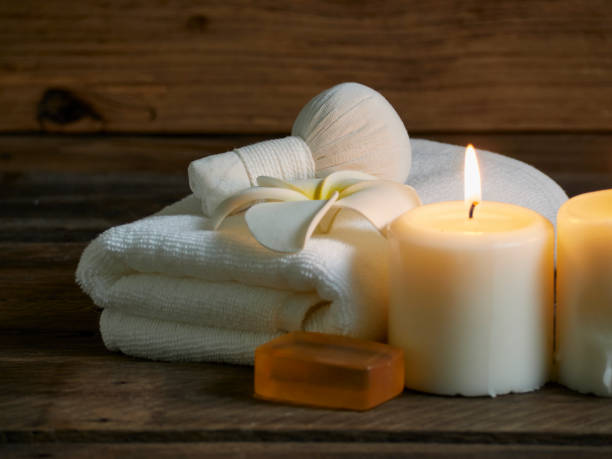 istock Spa composition with herbal compress ball, honey soap on wooden background. 1224081312
