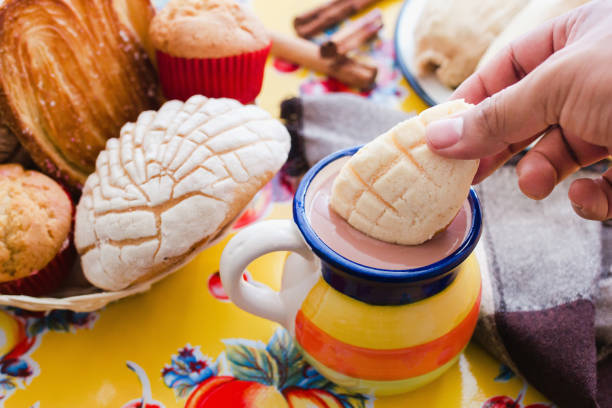 concha and chocolate, mexican sweet bread and atole beverage in mexico breakfast - pão doce imagens e fotografias de stock