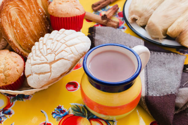 istock Atole de chocolate, mexican traditional beverage and bread, Made with cinnamon and chocolate in Mexico 1224081404