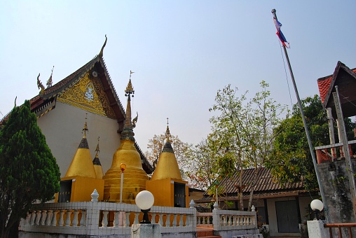 The old Phra That in Phra That Mae Yen Temple, Pai District, Mae Hong Son. Traditional pagodas before a fire incident in the temple.