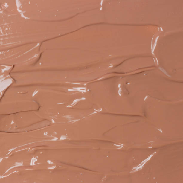 istock Brown tonal texture, basis cream, abstract cosmetic background close-up. 1224083595