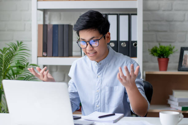istock Young Asian are video calling at home. Business and Technology Concept. 1224084151