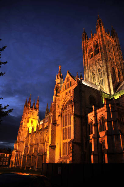 Canterbury Cathedral The gothic exterior of Canterbury Cathedral at night in England U.K. canterbury england photos stock pictures, royalty-free photos & images
