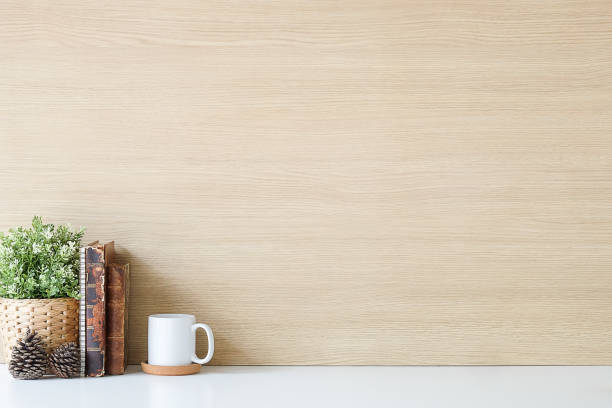 istock Mockup workspace desk and copy space books,plant and coffee on white desk. 1224086860