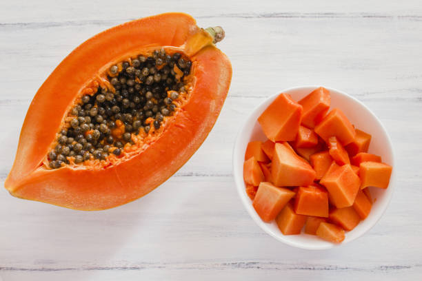 istock half of papaya fruit on a table 1224089093