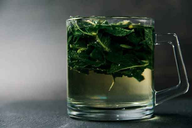 istock boiled mint leaves in a glass mug on a dark background 1224090860