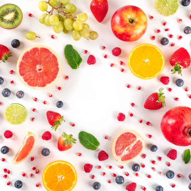 istock Fresh summer fruit design, a square flatlay on a white background with a place for text, vibrant food pattern, shot from above 1224091168