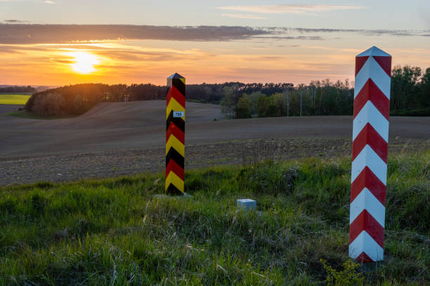 istock The Polish-German state border. Border posts on the border during sunset 1224092375