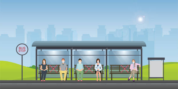 istock Social distancing concept with people wearing medical masks at the bus stop. 1224093542
