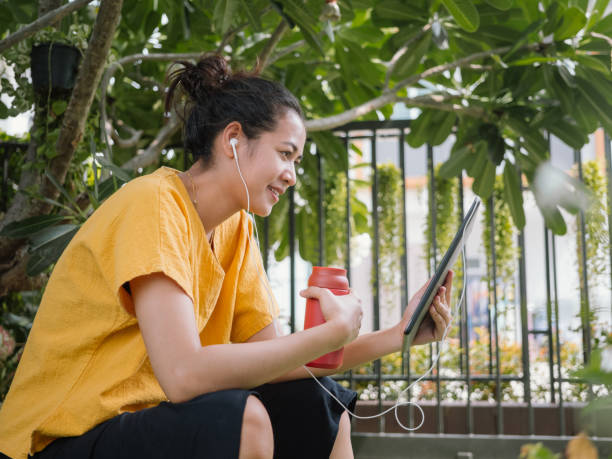 istock Woman Doing Freelance Work in Garden 1224095703
