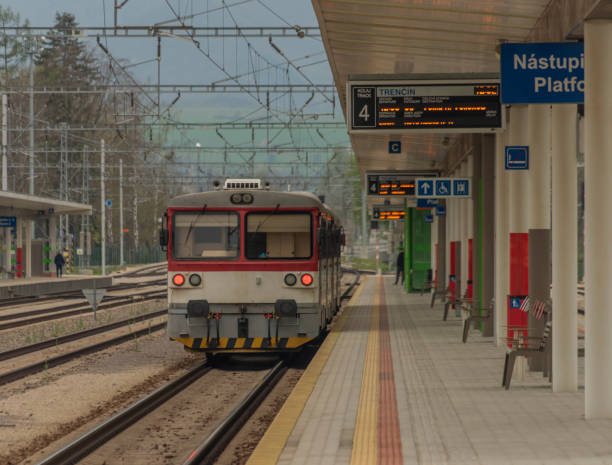 istock Small motor passenger train with red modern electric engine in Trencin station 1224096373
