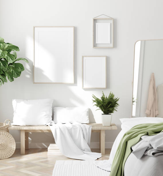 istock Scandinavian style white fresh bedroom interior with mockup frames on wall 1224096455