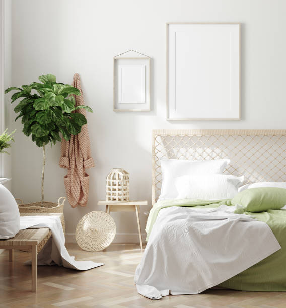 istock Scandinavian style white fresh bedroom interior with mockup frames on wall 1224096725