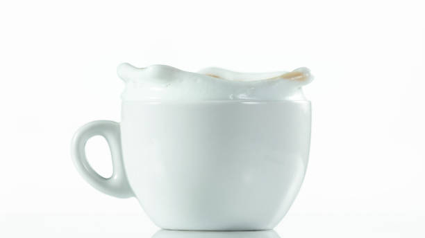 istock A cup with a large splash of coffee. 1224097739