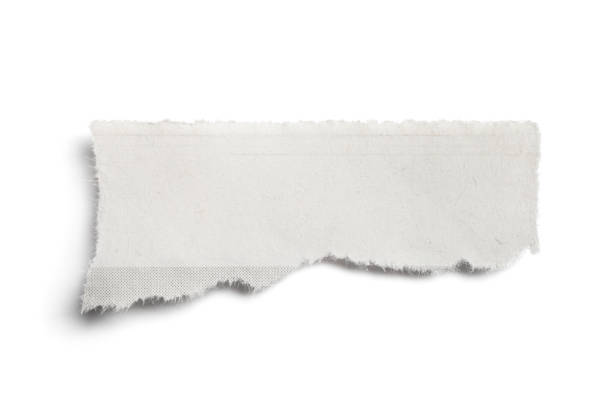 istock Front View Torn Piece of Newspaper on White Background 1224103746