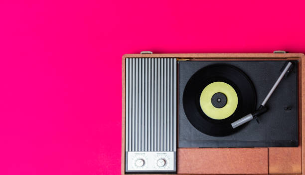 istock Retro vinyl player and recor player on a background 1224103994