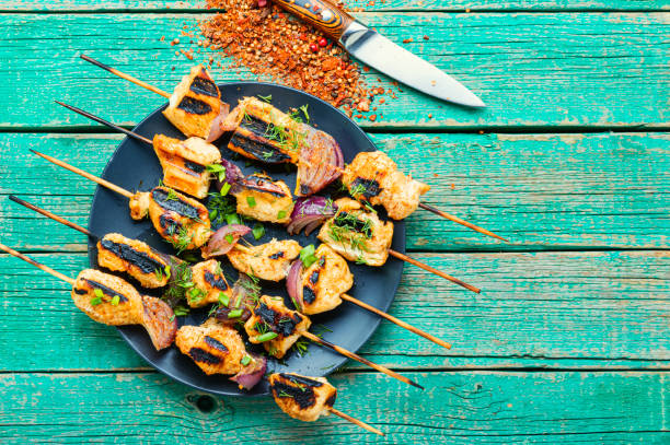 istock Bbq meat on wooden skewers 1224105354