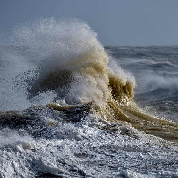 istock Amzing image of individual wave breaking and cresting during violent windy storm with superb wave detail 1224105438