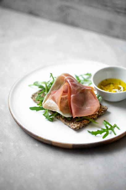 istock iberico ham sandwich on marble background with copy space 1224107677