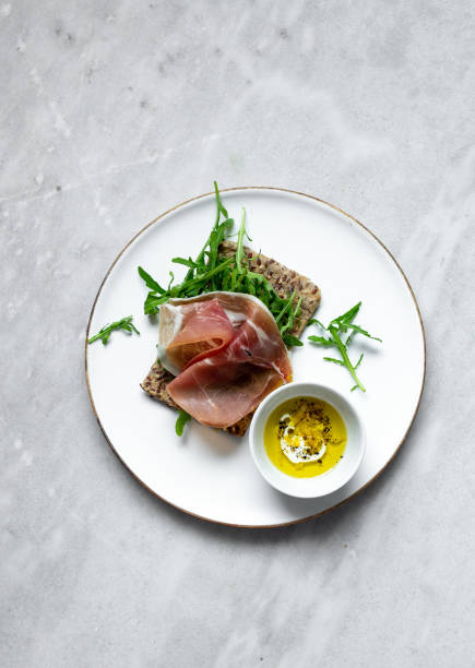 istock iberico ham sandwich on marble background with copy space 1224107730