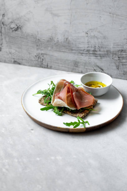 istock iberico ham sandwich on marble background with copy space 1224107740