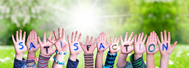 istock Children Hands Building Word Satisfaction, Grass Meadow 1224110060