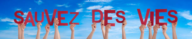 istock People Hands Holding Word Save Lives Means Save Lives, Blue Sky 1224110088