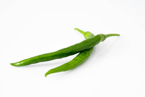 istock Green hot pepper on white background 1224110988