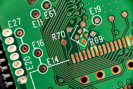 printed green computer circuit board macro photo