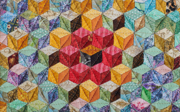 istock Fragment of quilt sewn from diamonds and has view three-dimensional 1224115883