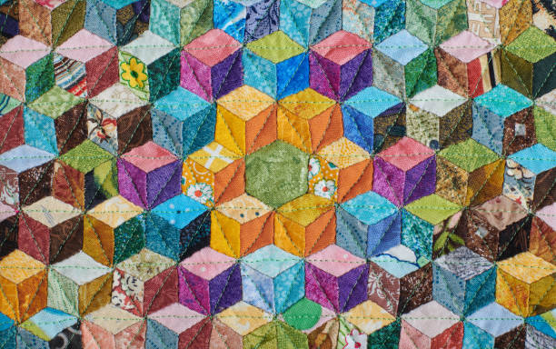 istock Fragment of quilt sewn from diamonds and has view three-dimensional 1224116026