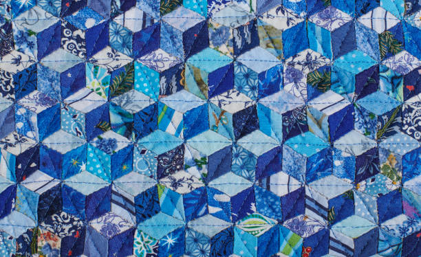 istock Fragment of quilt sewn from diamonds and has view three-dimensional 1224116101