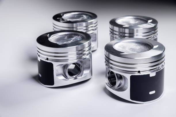 istock New parts for the internal combustion engine. Pistons on a gray gradient background 1224117014