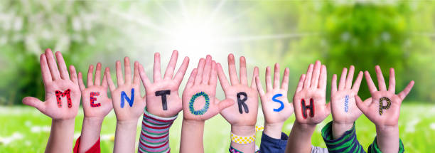 istock Children Hands Building Word Mentorship, Grass Meadow 1224117364