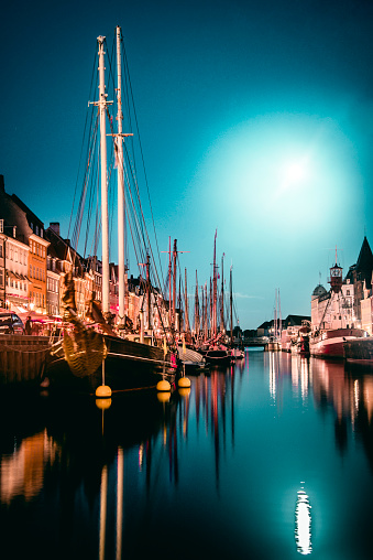 Moon Rising Over Nyhavn Canal In Copenhagen, Denmark