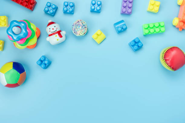 istock Table top view decoration kid toys for develop background concept.Flat lay accessories baby to play with items child on modern blue paper at office desk.Copy space for add text.pastel tone wallpaper. 1224118654