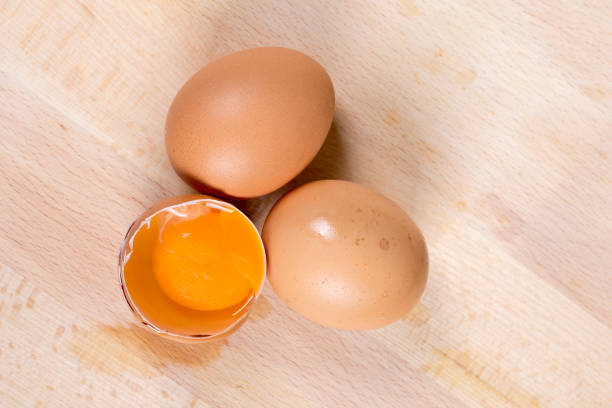 istock Flat lay eggs on the table yolk wooden table 1224119159