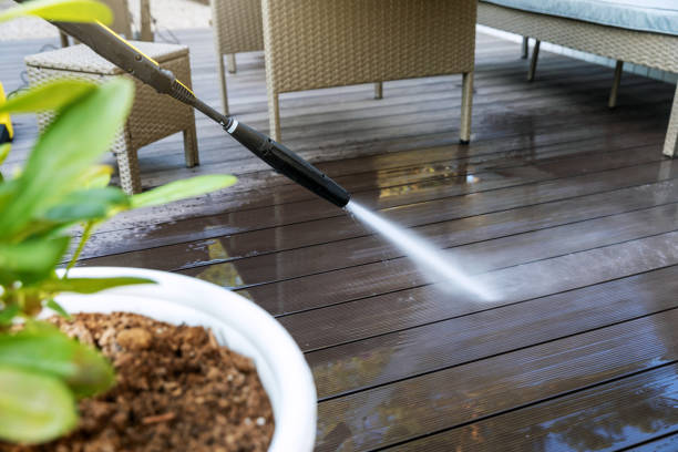 cleaning wooden terrace planks with high pressure washer cleaning wooden terrace planks with high pressure washer pressure washing deck stock pictures, royalty-free photos & images