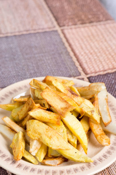 istock Roasted potatoes served on a plate 1224121319