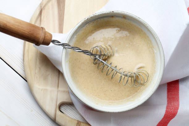 Whole-grain flour pancake dough in a ceramic bowl
