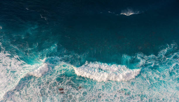 istock Aerial view to waves in ocean Splashing Waves. 1224126905