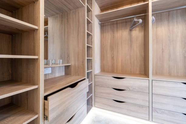 istock Empty storage sheleves and wardrobes in an utility room 1224130460