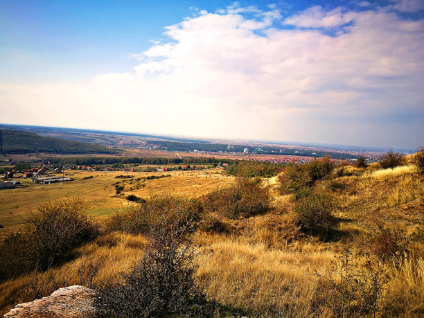 istock Steppe landscape, and a village surrounded by small hills 1224135167