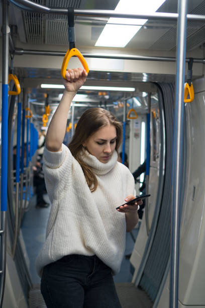 istock Girl in a subway car 1224135720