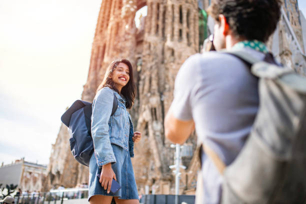 istock Smiling Indian Vacationer Posing for Picture in Barcelona 1224135975