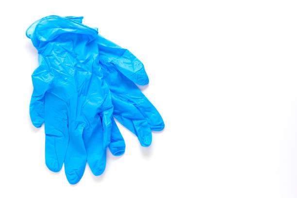 istock Blue medical glove isolated on white background 1224136004