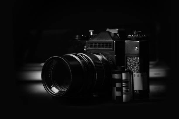 Depth of field scale and shutter release button of old film camera