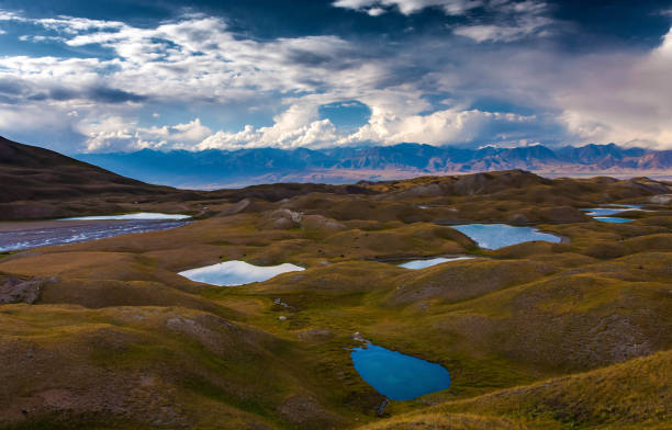 istock Beautiful landscape. Scenic lakes between mountains. Hilly terrain. Cloudy day. 1224140276