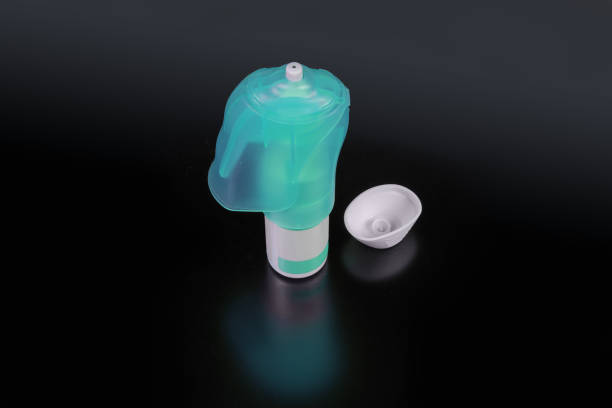 istock Eye drops in bottle with dispenser on dark surface 1224140475