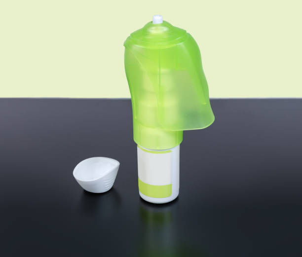 istock Bottle of eye drops with dispenser on dark surface 1224140503